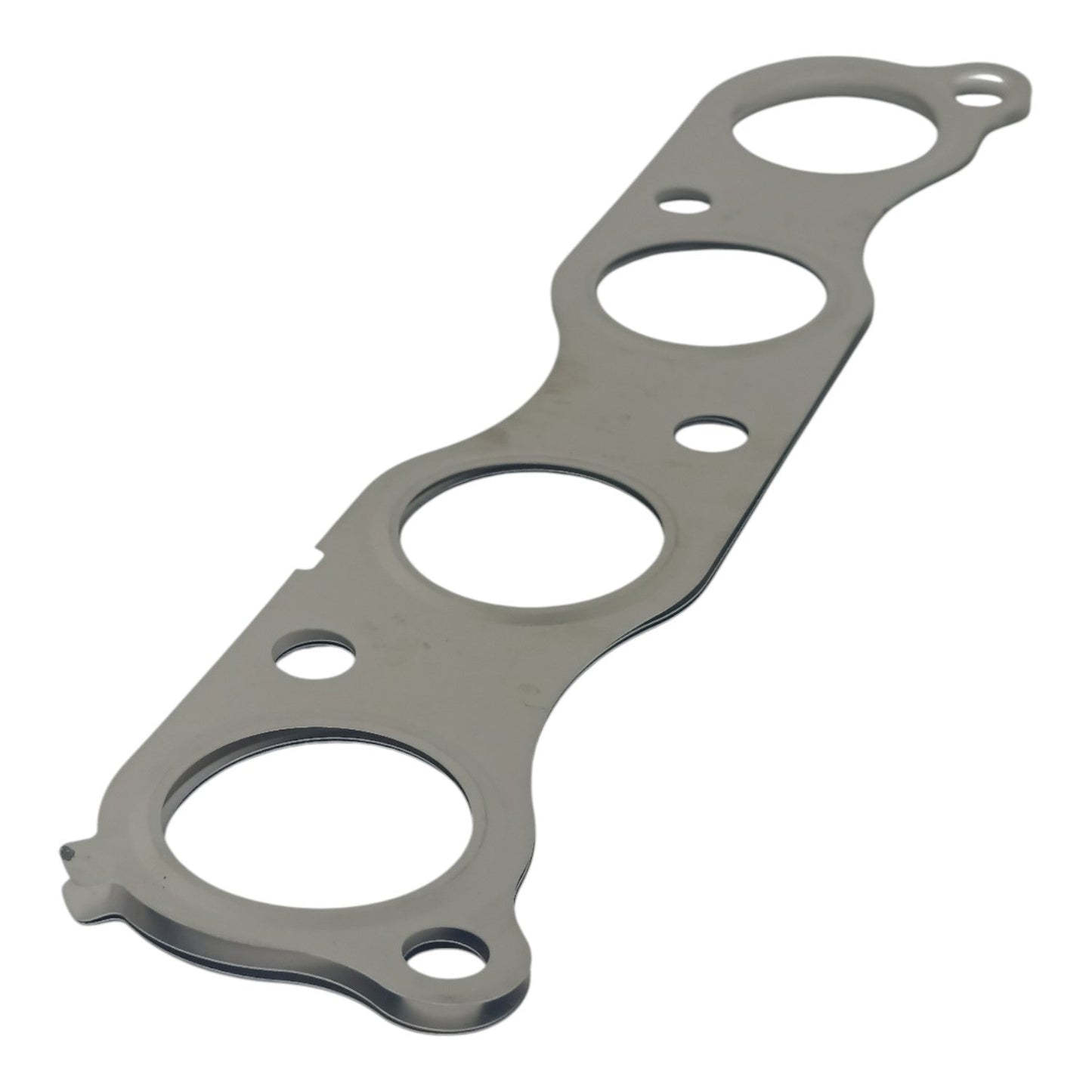 VISTA LATERAL DE EMPACADURA MULTIPLE ESCAPE SUZUKI 2021-2025 OEM